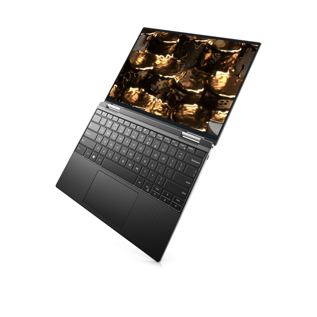 Laptop negru deschis, cu tastatură vizibilă și imagine aurie pe ecran.