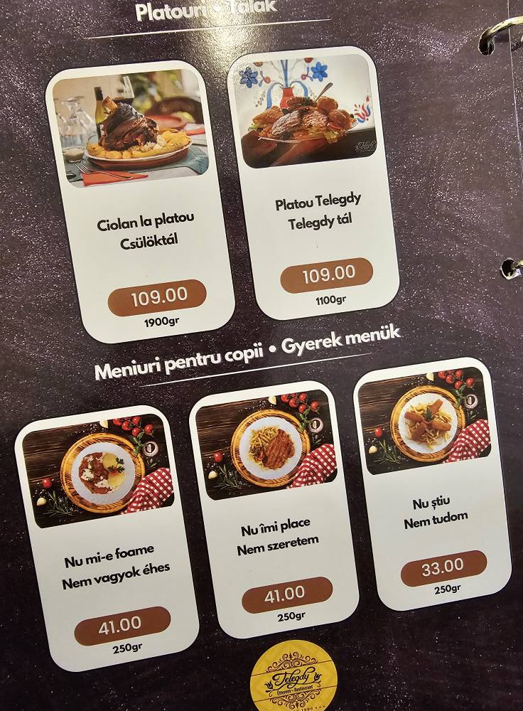 Meniu cu preparate ilustrate și prețuri, pe masă